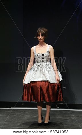 ZAGREB, CROATIA - NOVEMBER 07: Fashion model wearing clothes designed by Mitak and Gregl on the Fashion Wardrobe show on November 07, 2013 in Zagreb, Croatia.
