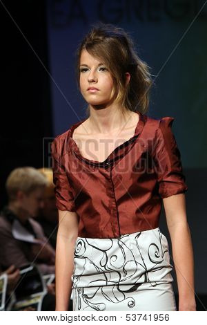 ZAGREB, CROATIA - NOVEMBER 07: Fashion model wearing clothes designed by Mitak and Gregl on the Fashion Wardrobe show on November 07, 2013 in Zagreb, Croatia.