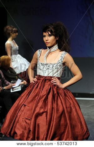 ZAGREB, CROATIA - NOVEMBER 07: Fashion model wearing clothes designed by Mitak and Gregl on the Fashion Wardrobe show on November 07, 2013 in Zagreb, Croatia.