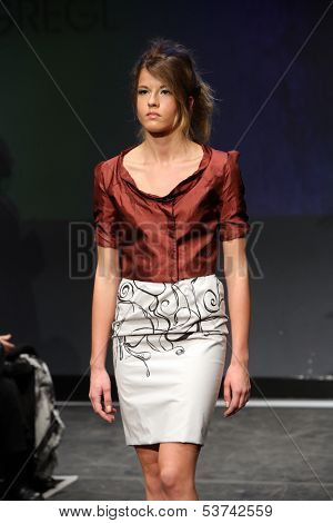 ZAGREB, CROATIA - NOVEMBER 07: Fashion model wearing clothes designed by Mitak and Gregl on the Fashion Wardrobe show on November 07, 2013 in Zagreb, Croatia.