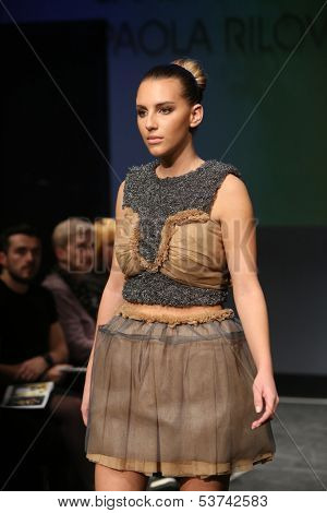 ZAGREB, CROATIA - NOVEMBER 07: Fashion model wearing clothes designed by Radetic and Topalovic on the Fashion Wardrobe show on November 07, 2013 in Zagreb, Croatia.