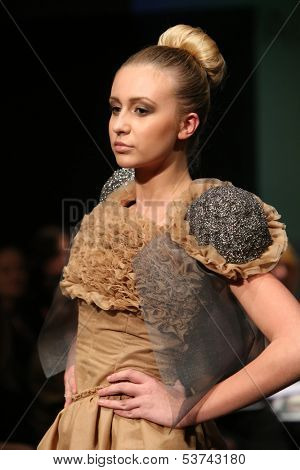 ZAGREB, CROATIA - NOVEMBER 07: Fashion model wearing clothes designed by Radetic and Topalovic on the Fashion Wardrobe show on November 07, 2013 in Zagreb, Croatia.