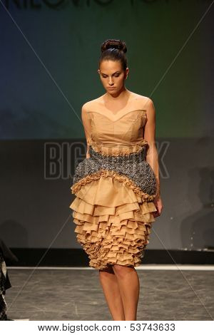 ZAGREB, CROATIA - NOVEMBER 07: Fashion model wearing clothes designed by Radetic and Topalovic on the Fashion Wardrobe show on November 07, 2013 in Zagreb, Croatia.