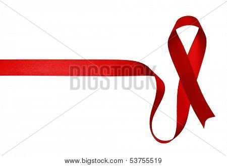 Shiny red satin ribbon on white background