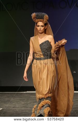 ZAGREB, CROATIA - NOVEMBER 07: Fashion model wearing clothes designed by Radetic and Topalovic on the Fashion Wardrobe show on November 07, 2013 in Zagreb, Croatia.