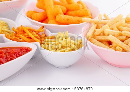 Potato, Corn And Wheat Chips In Bowls
