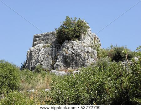 Preserved walls of hewn stone of the ancient Roman for