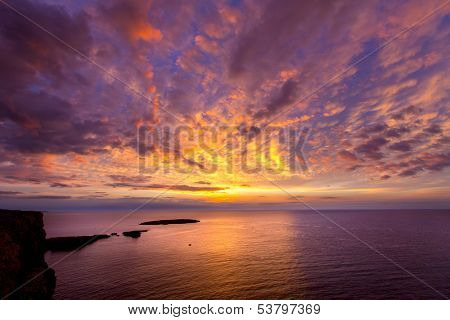 Menorca sunset in Cap de Caballeria cape at Balearic Islands es Mercadal