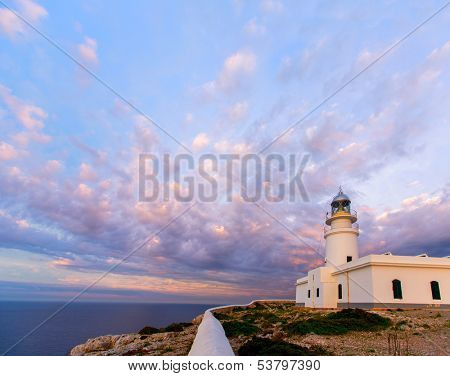 Menorca sunset in Faro Far de Caballeria Lighthouse at Balearic Islands es Mercadal