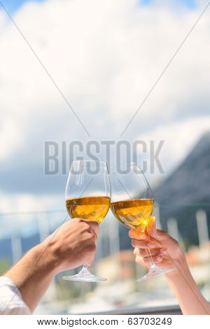 happy young couple having lanch at beautiful restaurant on by the sea on  beach
