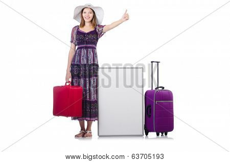 Woman in panama  preparing for vacation with suitcase and blankboard  isolated  on white