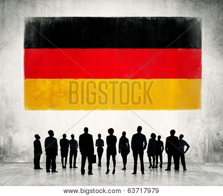 German flag and a group of business people.