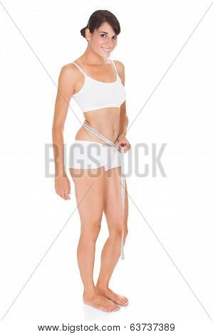 Young Woman With Measure Tape