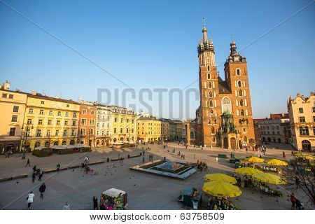 KRAKOW, POLAND - FEB 26, 2014: View of the Main Square. It dates to the 13th century, and at roughly 40,000 m it is the largest medieval town square in Europe.