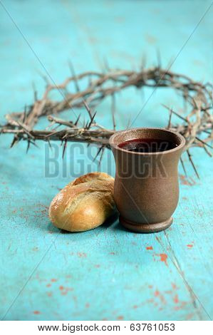 Bread, wine and crown of thorns as symbols of communion