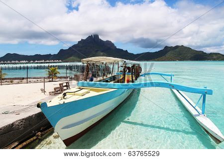 A boat with Bora Bora in the background