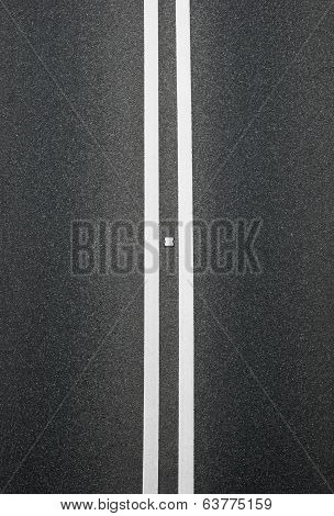 Double White Lines Divider On Blacktop Vertical