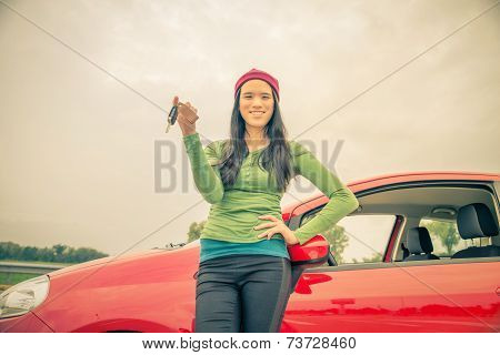 Asian Woman Showing Car Keys