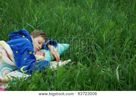 girl sleeping in the grass
