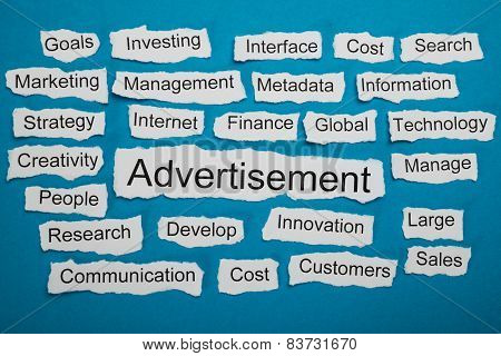 Word Advertisement On Piece Of Torn Paper