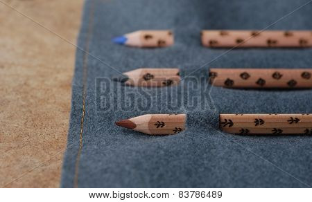 three pencils in the pencil case