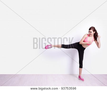 Sport Woman Kick Something