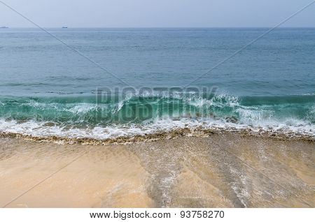 Sea Waves On The Sand Beach