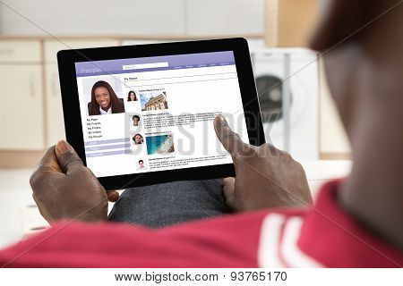 Man Chatting On Social Networking Site