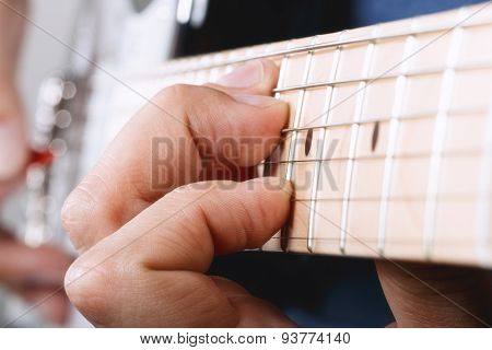 Hands Of Man Playing Electric Guitar