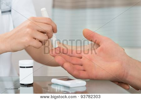 Doctor Check The Blood-sugar Level