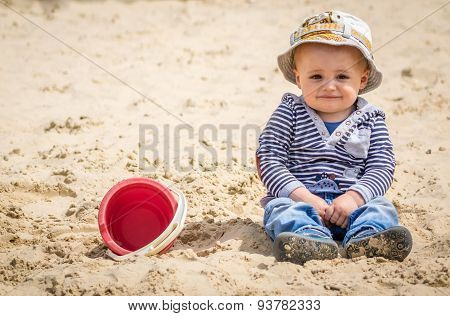 Boy in a sandpit