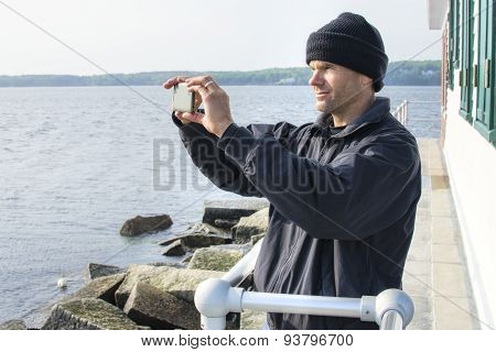 Man Takes Scenic Cell Phone Photo In Maine Harbor