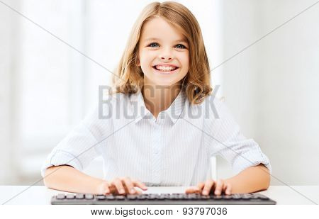 education, school and future technology concept - little student girl with keyboard and imaginary screen at school