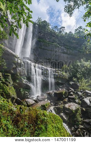 Landscape of Tad Huay Ping waterfall in deep rain forest of Bolaven Plateau Champasak Laos.