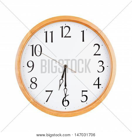 Half past six on a round clock face