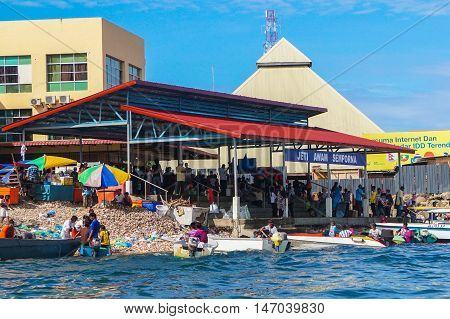 Semporna,Sabah-Sept 10,2016:Jetty of speedboats terminal public in Semporna,Sabah,Borneo on 10th Sept 2016.This Jetty is the entry to all local activity in Semporna in town.
