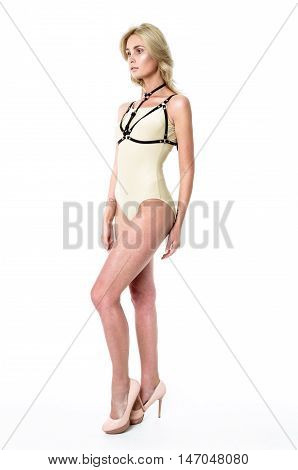 Blonde girl wearing bodysuit and black leather belt