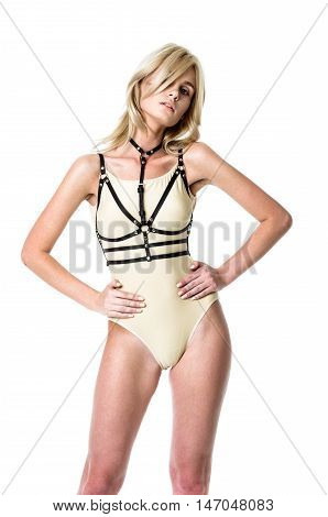 Blonde girl wearing bodysuit and black leather belt