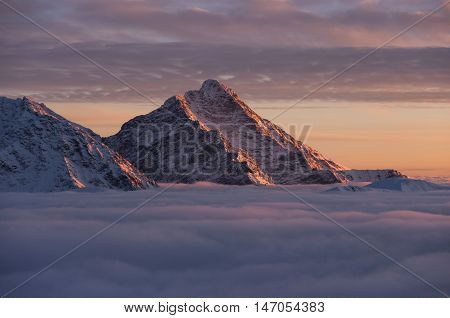Kriváň at sunset . Slovak Tatra mountains. Inversion.