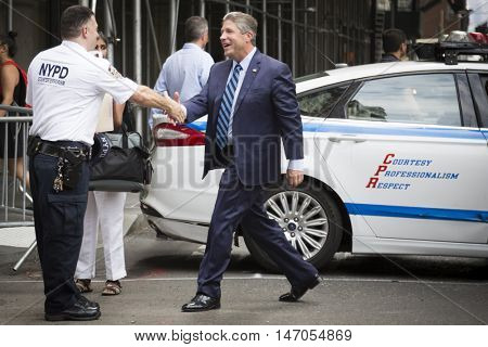 NEW YORK - SEPT 9 2016: New York PBA President Pat Lynch greets officers and patrolmen at the NYPD Emerald Society Pipe and Drums 9/11 Memorial Commemoration on the 15th anniversary of the attacks.