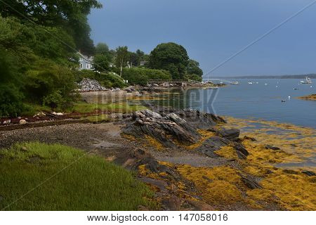 Rocky coast of Bustin's Island in Casco Bay Maine.