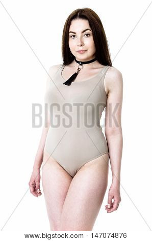 Brunette girl wearing bodysuit and black chocker with tassel