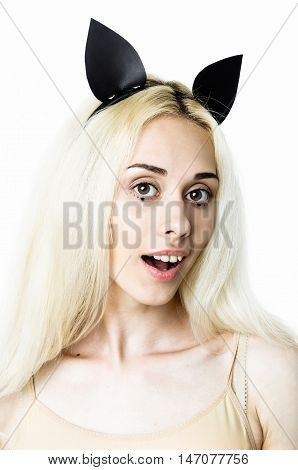 Blonde girl wearing bodysuit and black leather ears