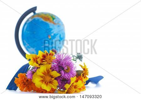bouquet of autumn flowers with a globe on a white background