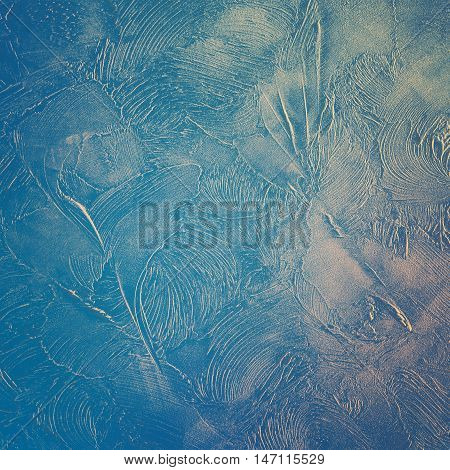 Decorative plaster. Abstract pattern in blue tones.