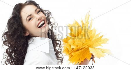 portrait of attractive  caucasian smiling woman isolated on white studio shot looking at camera businesswoman hand holding yellow marple autumn leaves