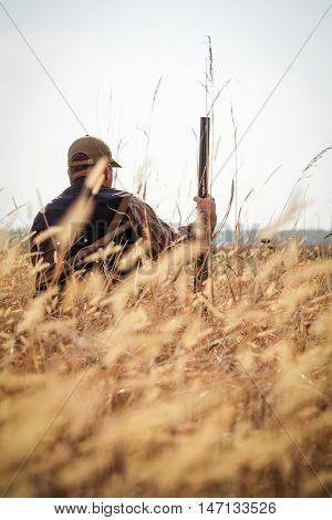 Hunter aiming the hunt during the hunting season