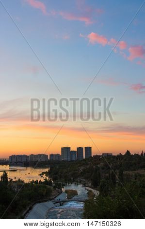 Sayran lake - evening city view Almaty Kazakhstan