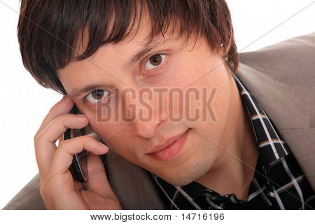 a telefon, elszigetelt fehér fiatal üzletember