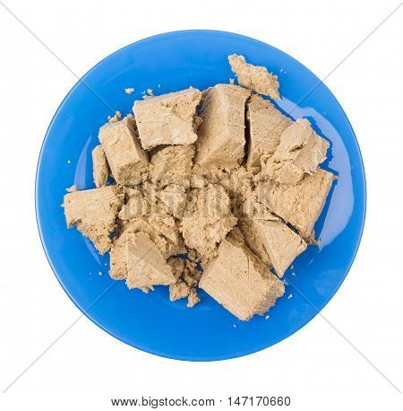 Halvah in a plate isolated 